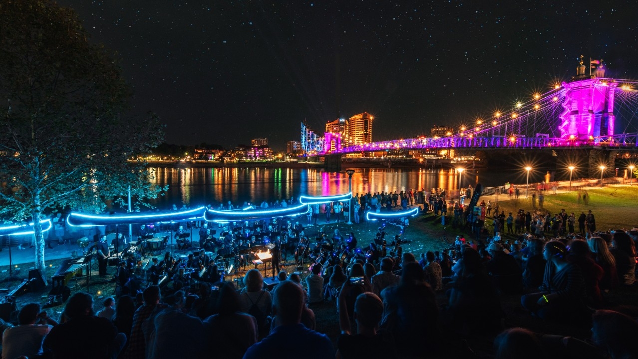Orchestra performing at Ohio River banks