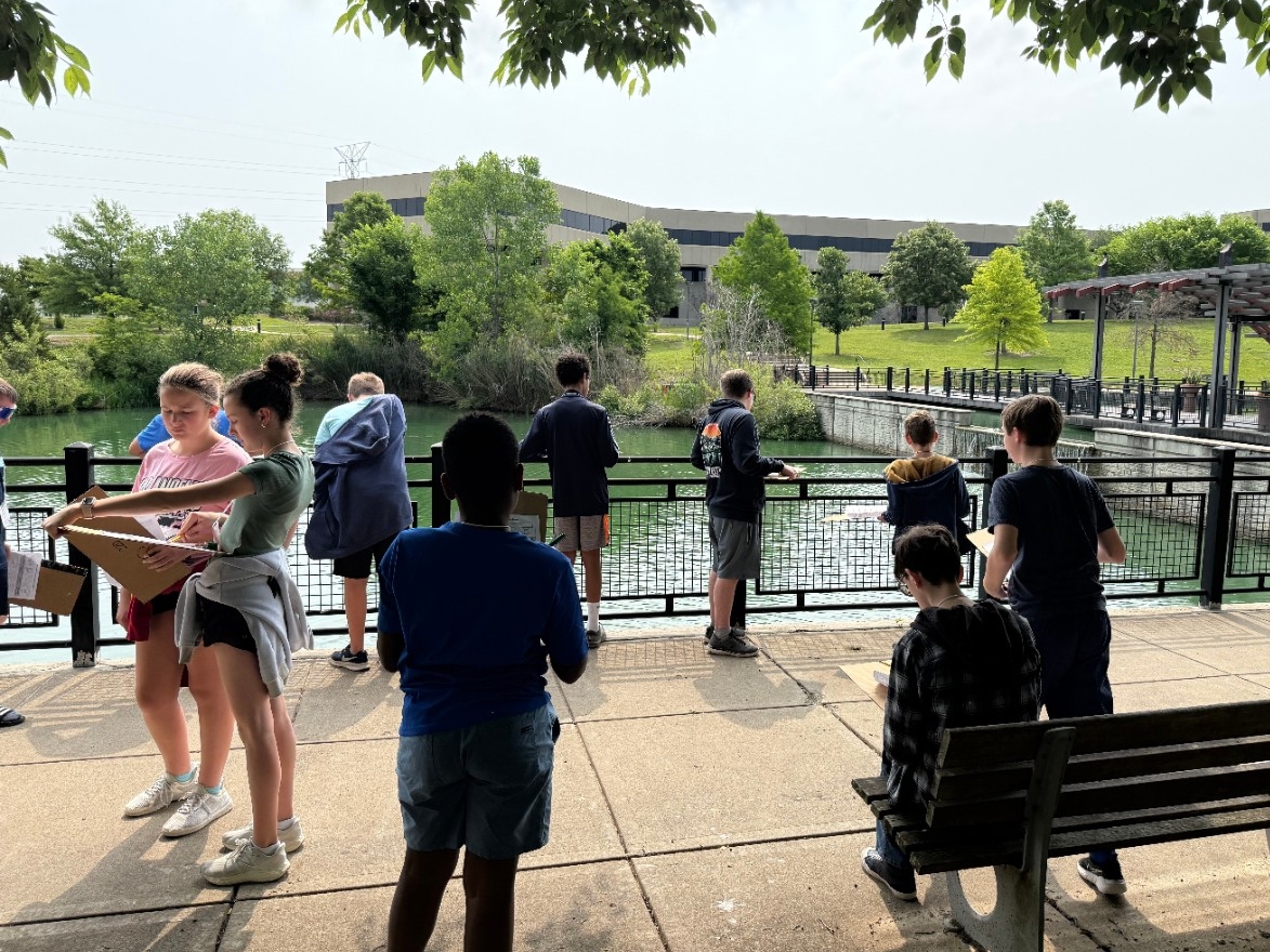 Middle school-aged students STEM observations outside by Loch Norse.