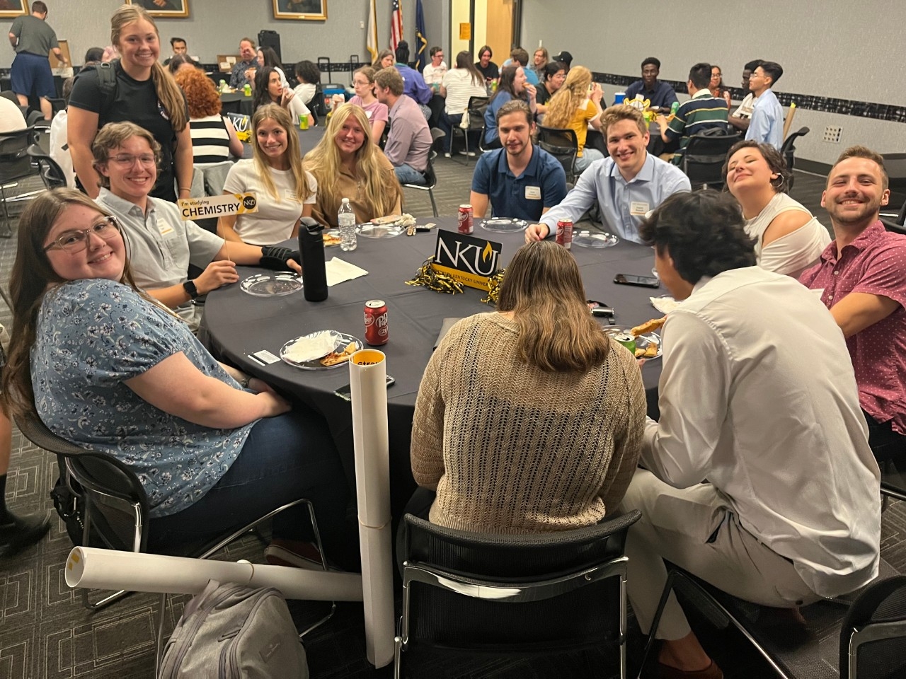 STEM majors pack the room with fun, smiles, friends, and pizza