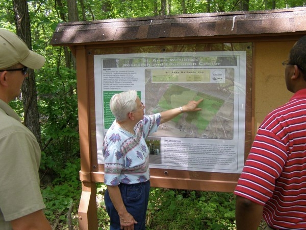 Sr Mary Jo at the main kiosk at the St. Anne Wetlands