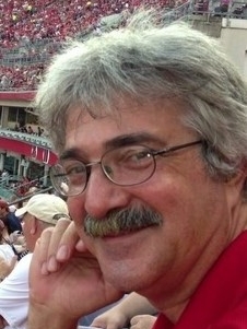 Photo of Dr. Dahlem at a Cincinnati Reds game.
