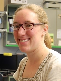 Photo of Dr. Shifley smiling in the lab.