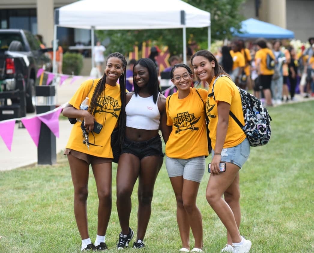 Students posing together at an event