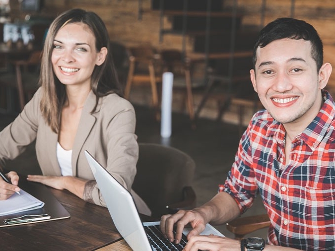 Young professionals working at a desk