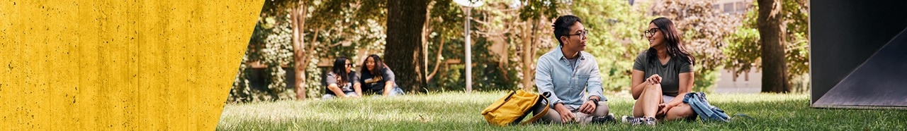 NKU students sitting outside