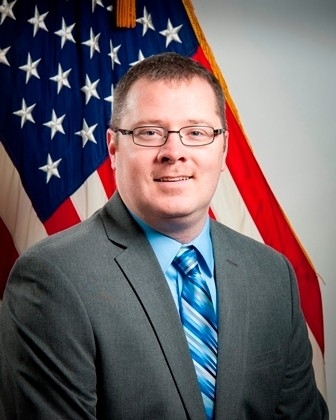 James E. Mills Jr.