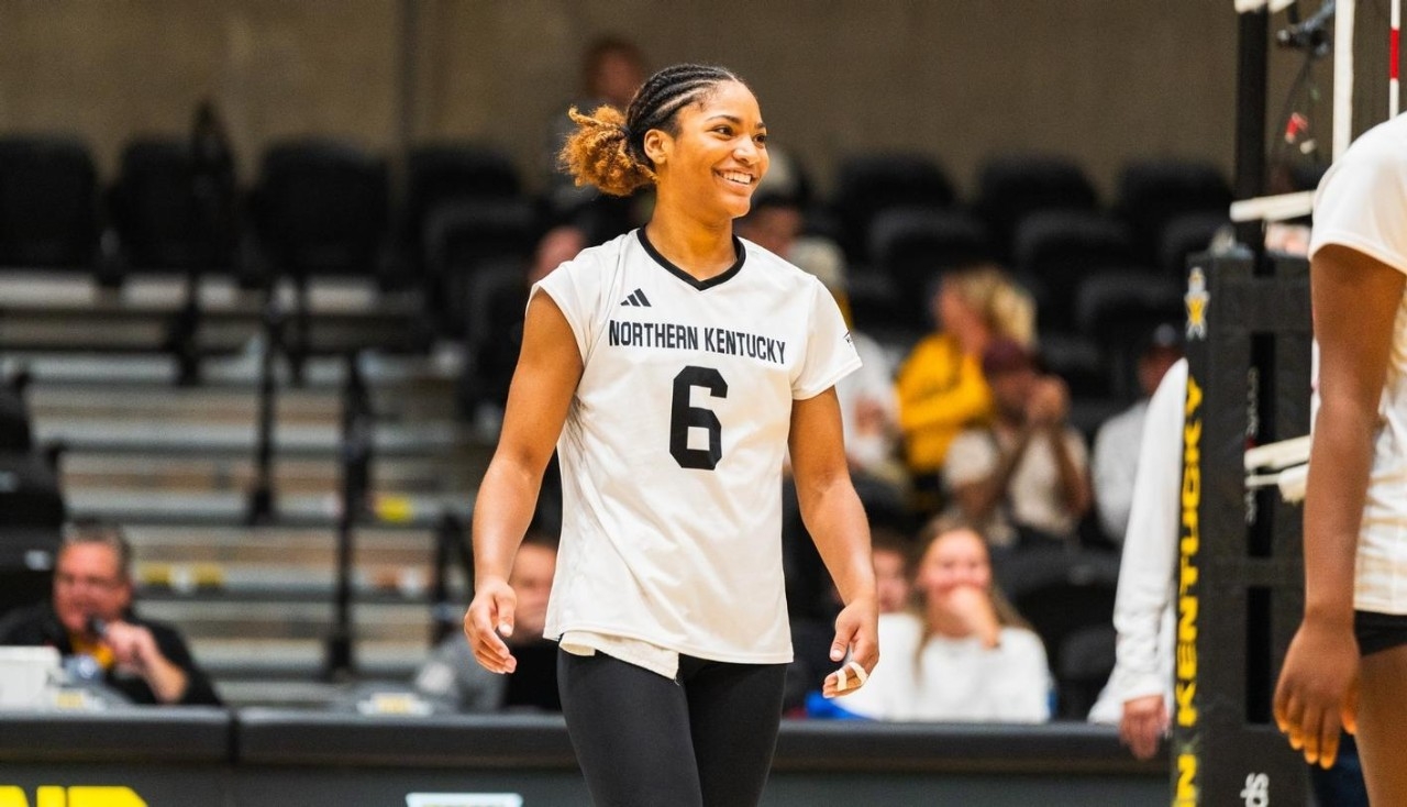 Joy Banks on a volleyball court