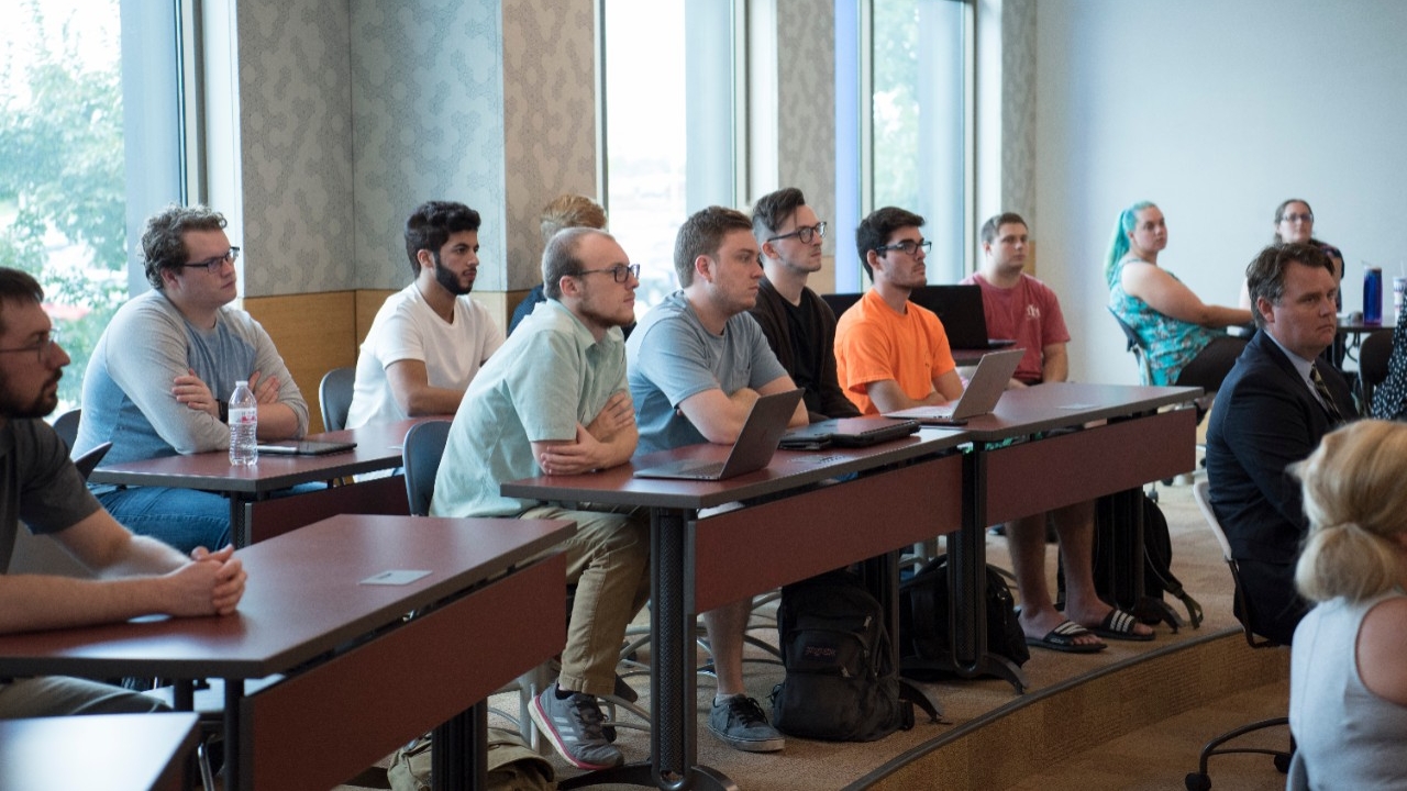 Students meet for a lecture in a classroom in Griffin Hall