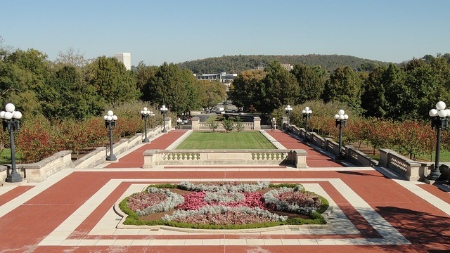 Courtyard outside Frankfort capitol building during the day.