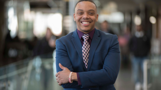 Businessman in suite smiling 